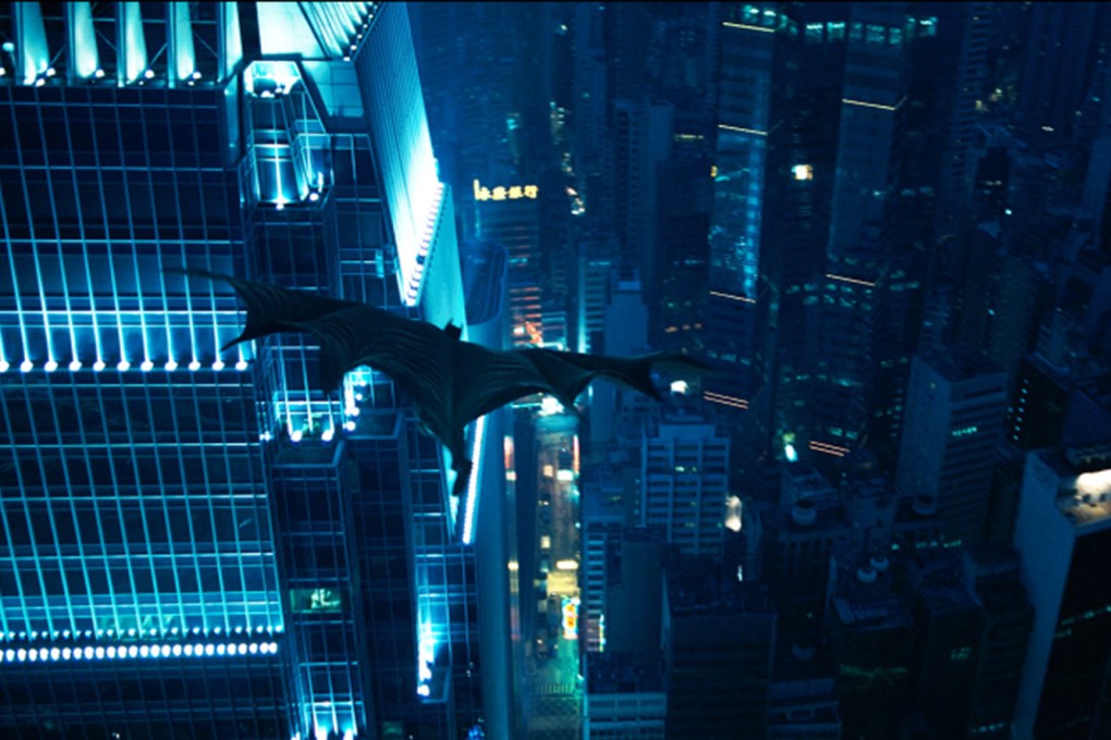 Batman swoops over Hong Kong’s Central district in a scene from The Dark Knight, which failed to impress China despite its makers’ intentions. Photo: Warner Brothers