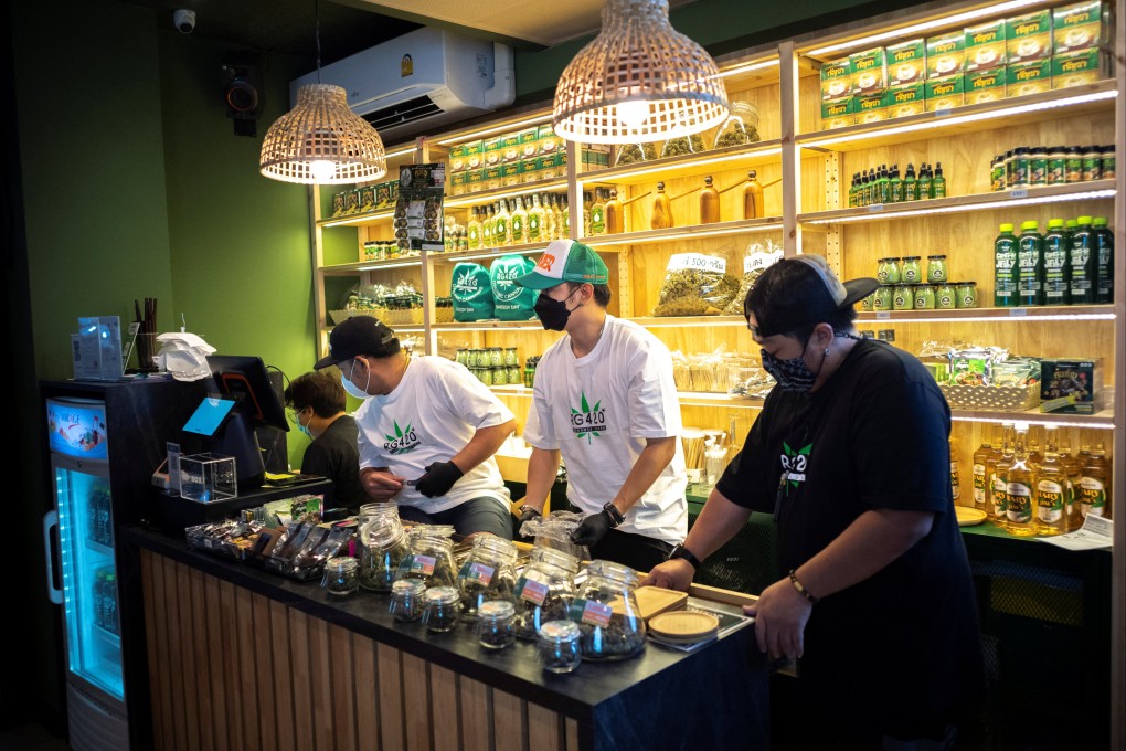 Staff prepare cannabis products at a store on Khao San Road, a favourite tourist spot in Bangkok, Thailand. The country has legalised medicinal cannabis and decriminalised recreational use of the drug. Photo: Reuters/Athit Perawongmetha