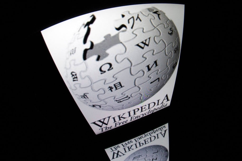 The Wikipedia logo seen on a tablet screen in Paris on December 4, 2012. Photo: AFP