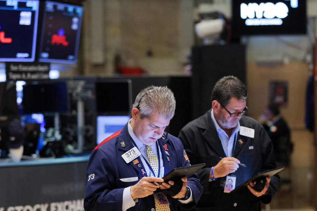 Traders work on the New York Stock Exchange floor in Manhattan, on August 3. Photo: Reuters