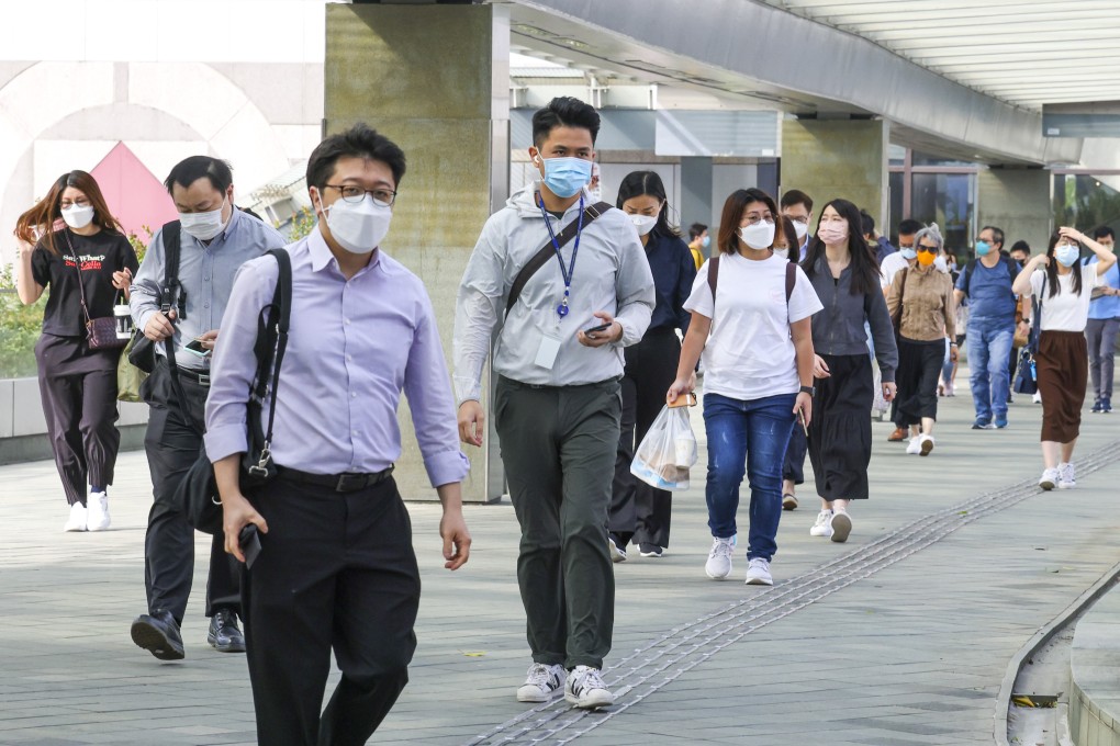 Civil servants arrive for work at the Central Government Offices at Tamar in Admiralty. Photo: Nora Tam
