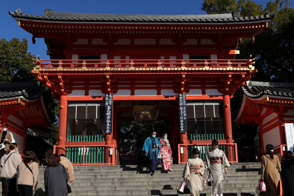 Visitors at Fushimi Inari-taisha shrine in Kyoto. Domestic travel is booming in Japan as more people learn to live with Covid-19. Photo: Getty Images