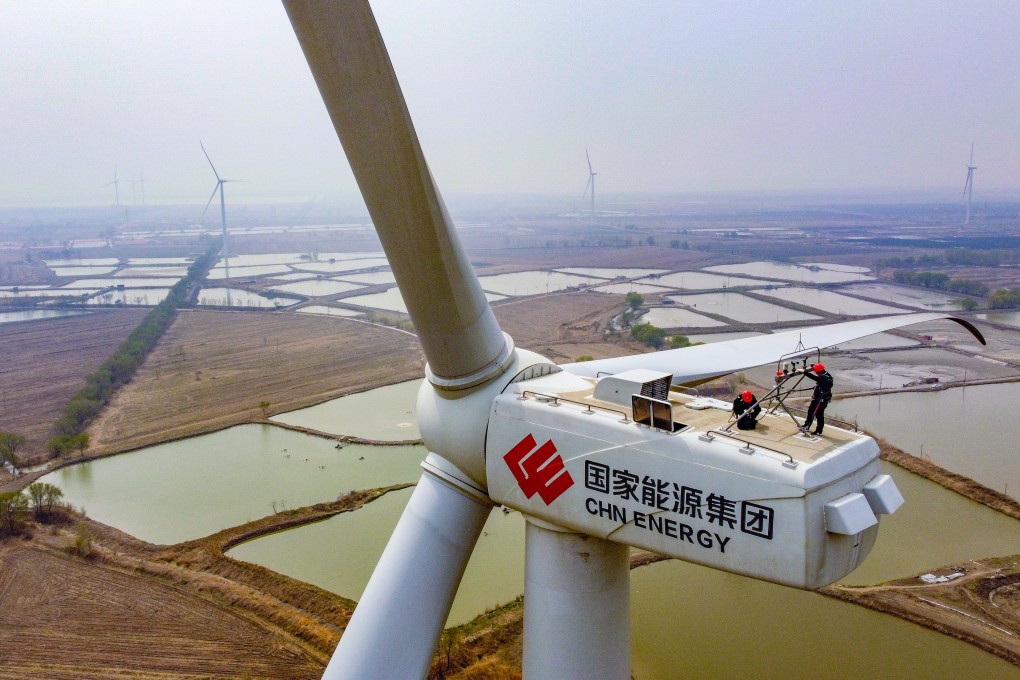 Technicians examine a wind turbine in Binhai New Area, in north China’s Tianjin, on April 11, 2022. Photo: Xinhua