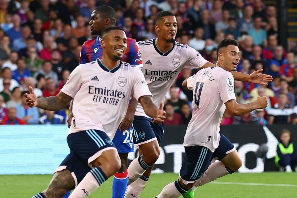 Arsenal’s Gabriel Martinelli celebrates scoring their first goal against Crystal Palace with Gabriel Jesus and William Saliba. Photo: Reuters