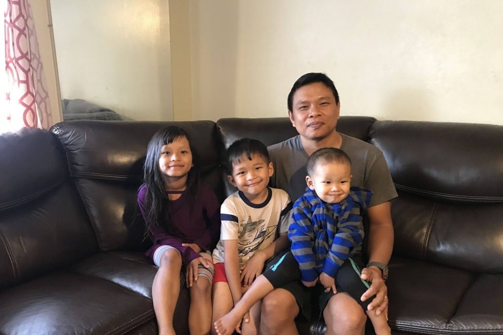 Bawi Cung with his children at his home in Texas. File photo: Bawi Cung via AP