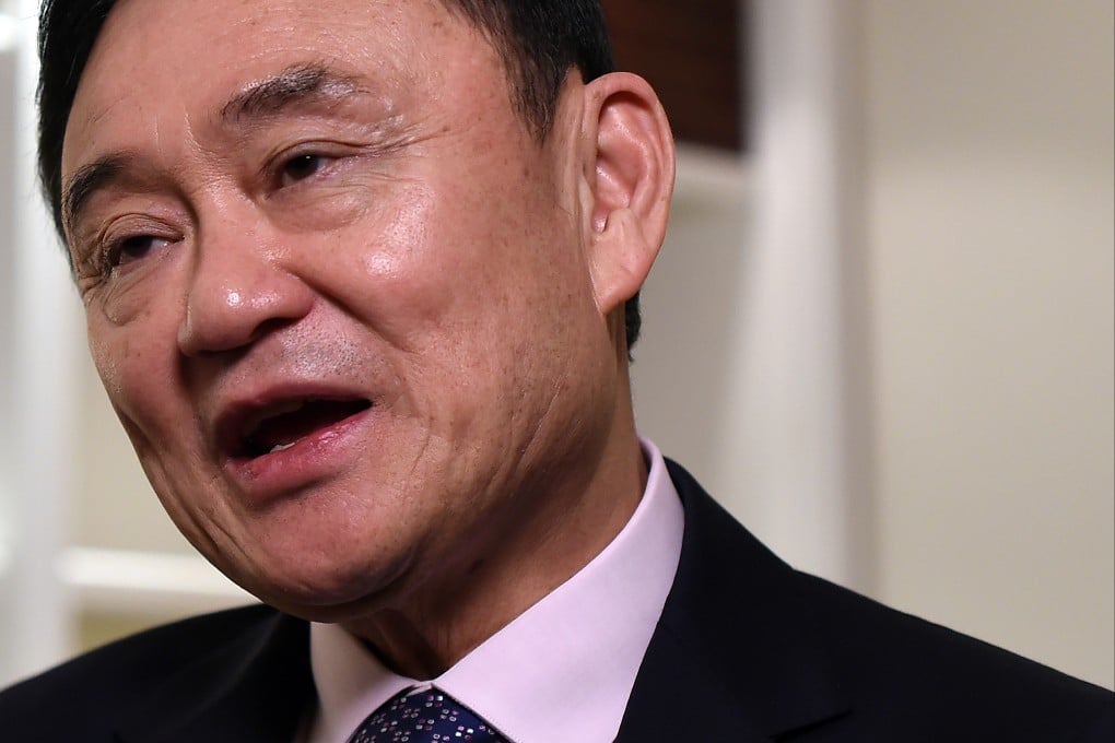Currently in exile, deposed former Thai Prime Minister Thaksin Shinawatra has called on supporters of the Pheu Thai party to vote strategically to end the reign of Prime Minister Prayuth Chan-ocha. Photo: AFP/File