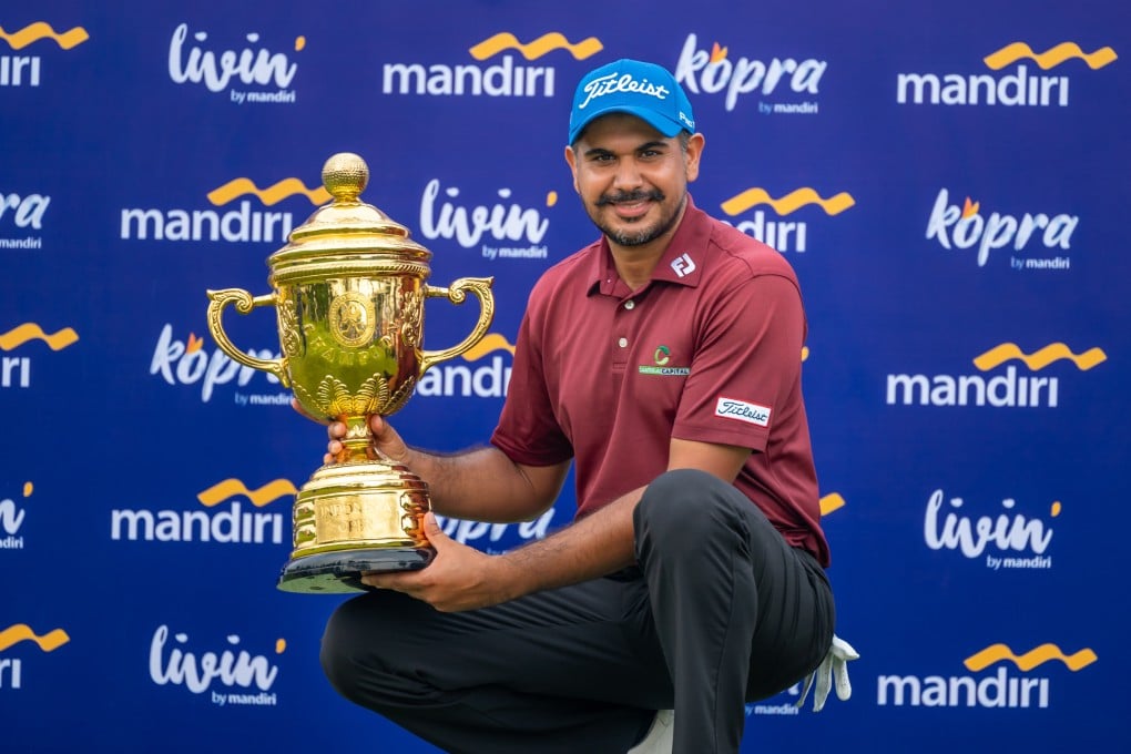 Gaganjeet Bhullar of India lifts the trophy after winning the Indonesia Open at Jakarta’s Pondok Indah Golf Course. Photo: Asian Tour