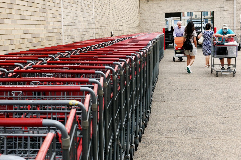 People walk outside a Costco in Arlington, Virginia, on July 28. Headline consumer price inflation has hit a nearly 41 year-high at 9.1 per cent, even as two successive quarters of negative growth in the first half of the year mean the US economy has entered a technical recession. Photo: AFP
