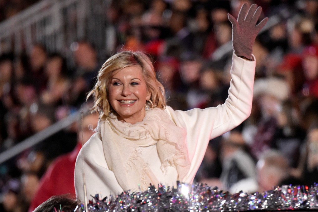 Olivia Newton-John rides in the 85th annual Hollywood Christmas Parade in Los Angeles in November 2016. Photo: Reuters