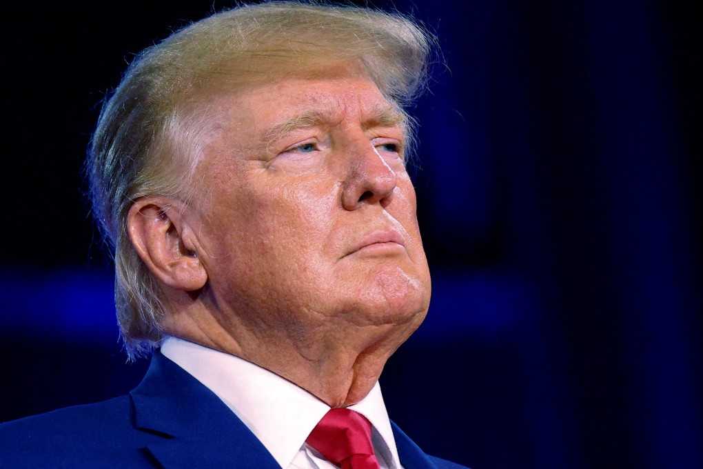 Former U.S. President Donald Trump takes the stage at an event in Texas. Photo: Reuters
