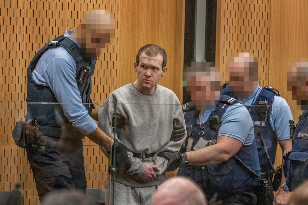 Christchurch mosque attack gunman Brenton Tarrant (2-L) listens to victim impact statements during a hearing at the High Court in Christchurch, New Zealand, 25 August 2020. Photo: EPA-EFE