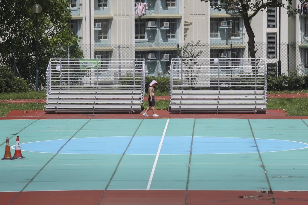 The sun beats down on a man exercising at a sports ground in Lam Tin on July 8. Photo: Xiaomei Chen