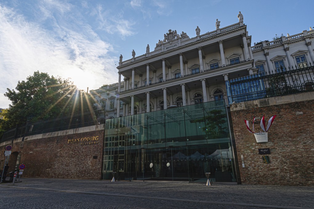 The sun sets behind the Palais Coburg on Friday, at the site where closed-door nuclear talks take place in Vienna. Photo: AP