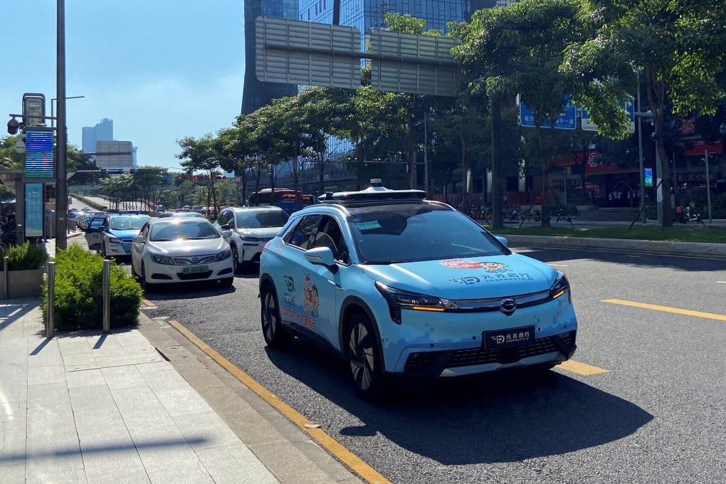 A car equipped with an autonomous driving system developed by tech start-up DeepRoute.ai runs on a street in Shenzhen, in southern Guangdong province, on July 27, 2022. Photo: Reuters