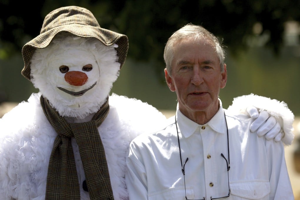 Author Raymond Briggs in Hyde Park, London, with a figure dressed as his best known character from 1978 book The Snowman. Briggs died aged 88 on August 10. Photo: Anthony Devlin/PA via AP