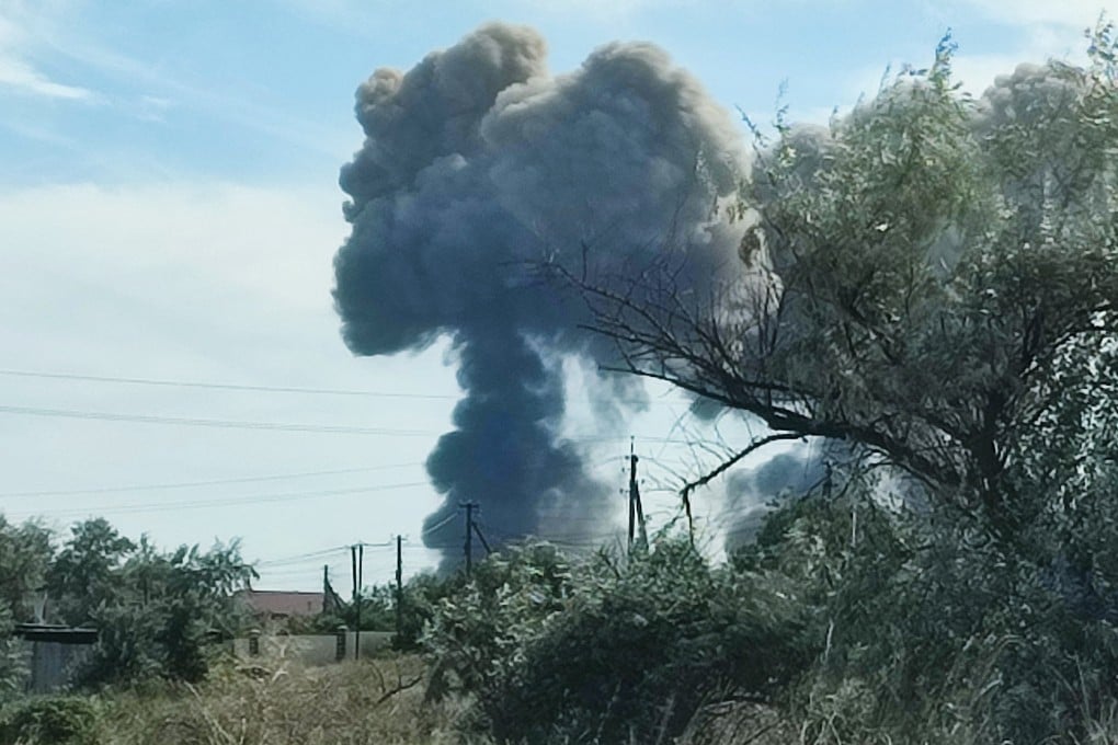 Smoke rises after explosions were heard from the direction of a Russian military airbase near Novofedorivka, Crimea on Tuesday. Photo: Reuters