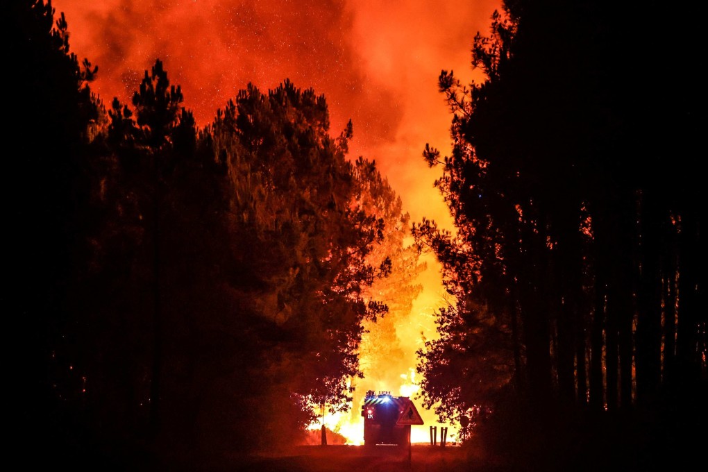 A firefighters’ truck heads towards a wildfire in southwestern France on August 11. Photo: AFP