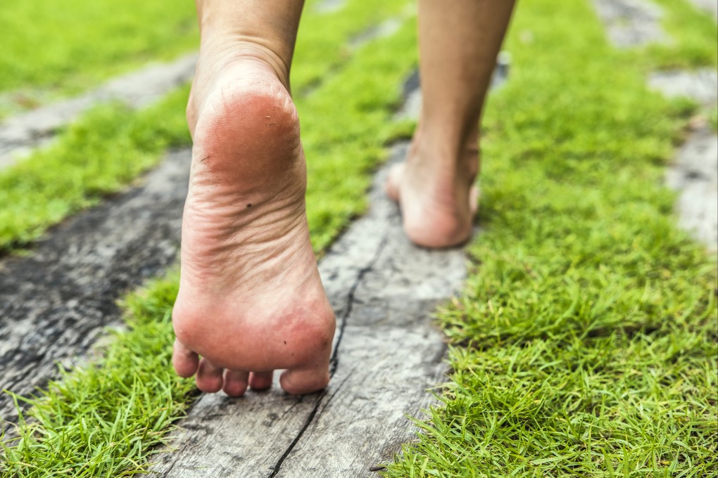 Earthing, or grounding, involves walking barefoot outside, and helps you sleep better, relieves relief, reduces inflammation and prevents heart disease, say practitioners. Photo: Shutterstock