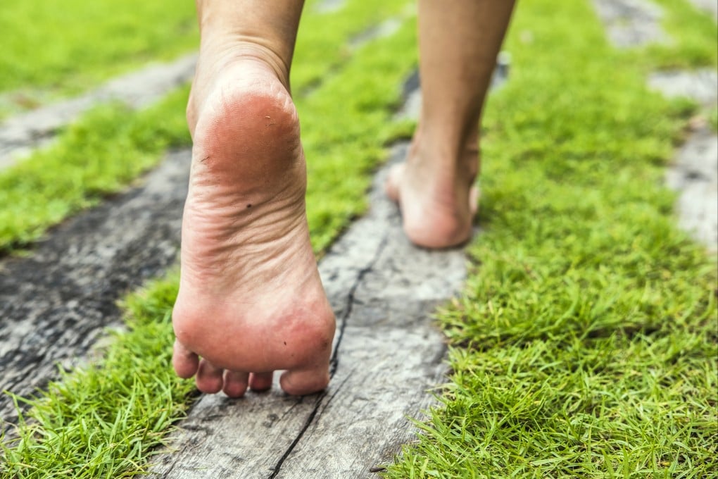 Earthing, or grounding, involves walking barefoot outside, and helps you sleep better, relieves relief, reduces inflammation and prevents heart disease, say practitioners. Photo: Shutterstock