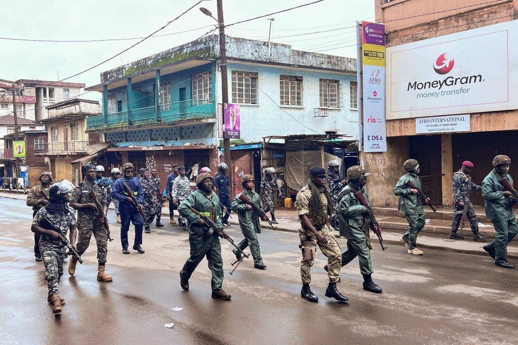 Riot police patrol in Freetown, Sierra Leone during anti-government protests on Wednesday. Photo: Reuters