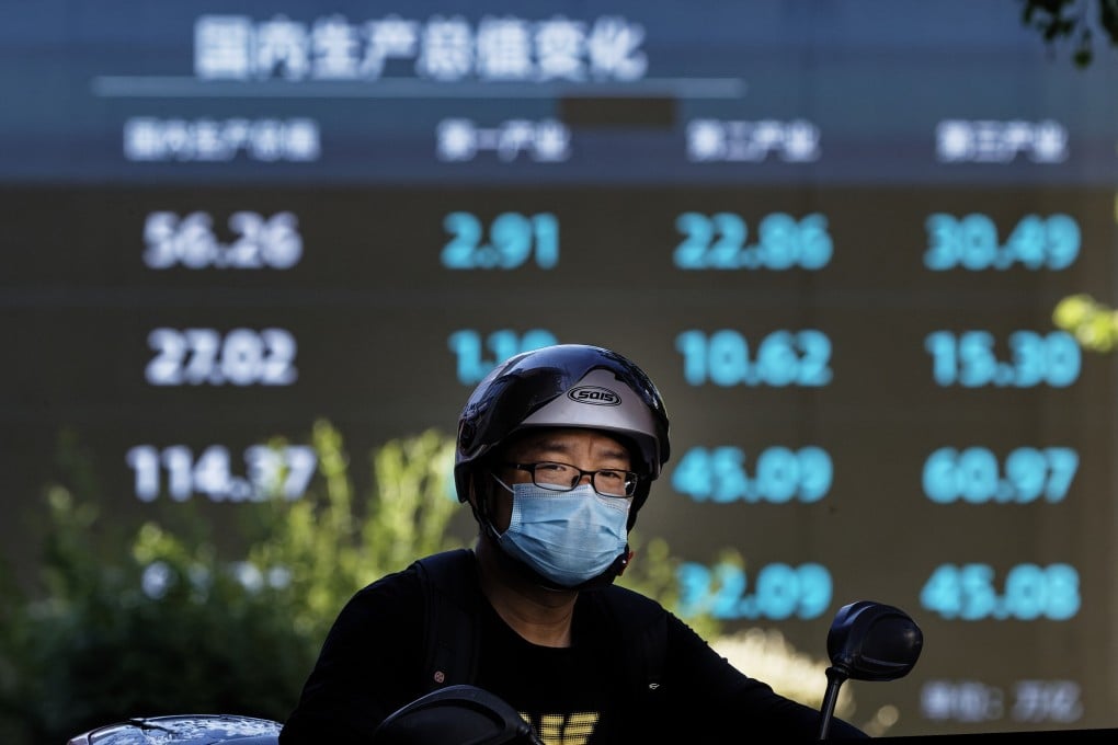 A display shows stock indices in Shanghai. Chinese small-caps are lagging behind the big guns for the first time in their history because the lifting of a two-month lockdown in Shanghai has spurred the buying of bigger companies on expectations that the city’s reopening will benefit industry leaders more. Photo: EPA-EFE