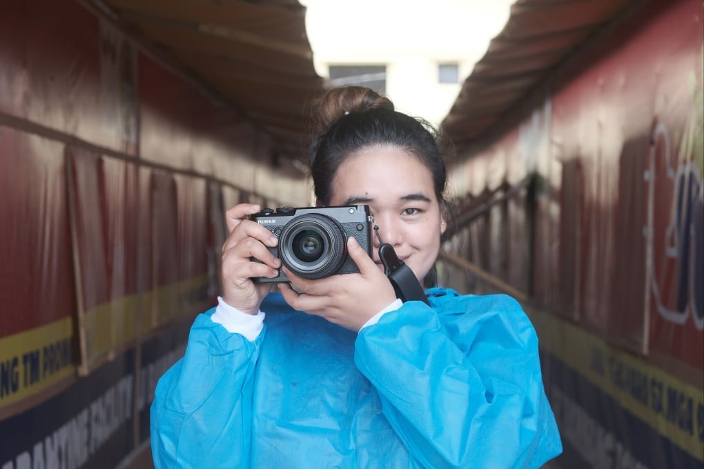 Hong Kong domestic helpers’ images of sacrifice and separation will feature in an exhibition. Award-winning photographer and former helper Xyza Cruz Bacani (above) will be selecting the photos. Photo: Polaris Norton Sagabaen and Novice