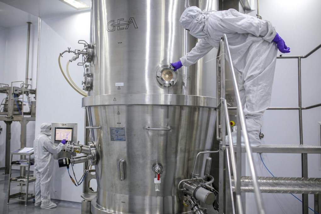 Employees work in a granulation unit at pharmaceutical firm Laurus Labs in Visakhapatnam, India, as the country looks to reduce its dependence on Chinese drug ingredients. Photo: Bloomberg