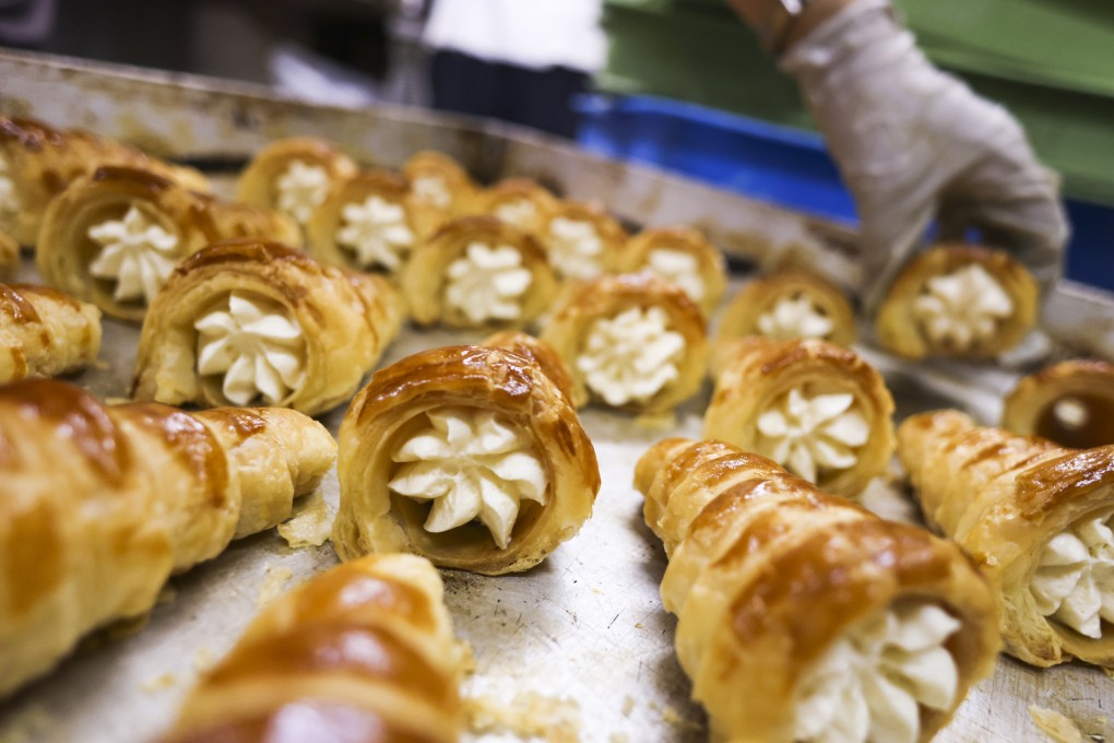 Happy Cake Shop in Wan Chai, which closed in August, was beloved for its cream cones. As long as Hong Kong keeps pouring money in, we will be able to preserve historic buildings and mass-produce cream cones. But this is not the same as preserving heritage, context and that which makes Hong Kong unique. Photo: Dickson Lee