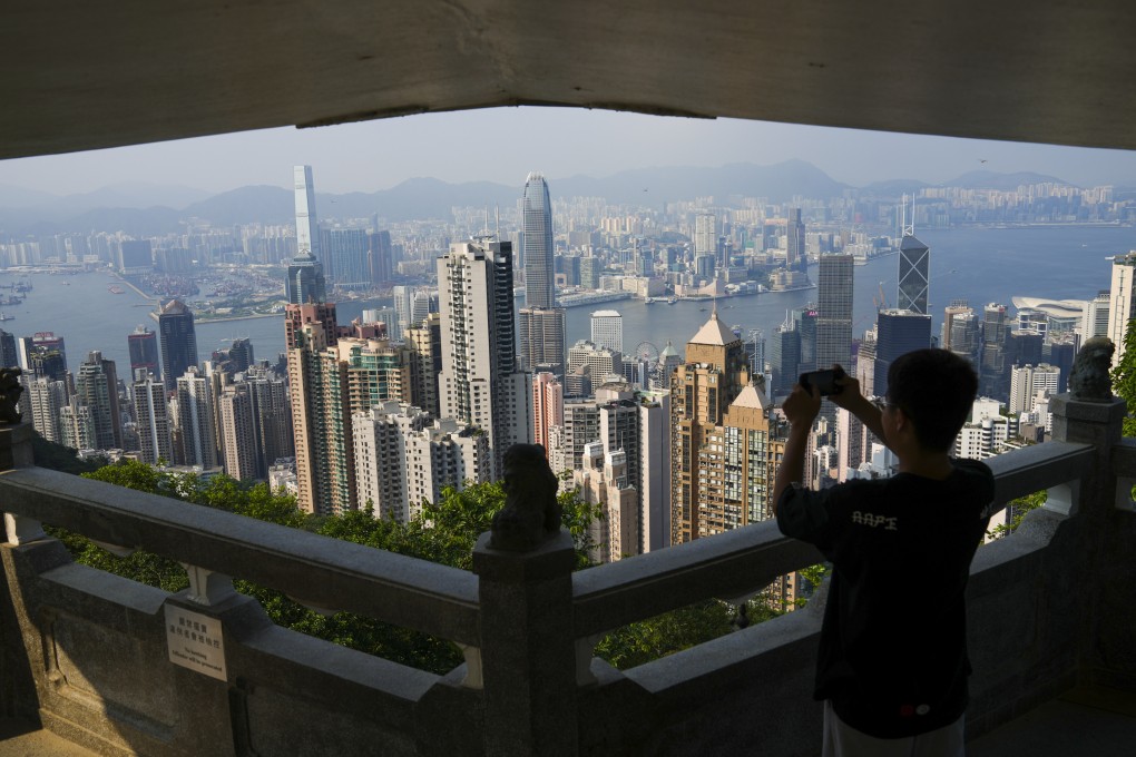A view of Hong Kong from the Lions Pavillion on the Peak. The city’s international reputation suffers, as does its economy, while the rest of the world lives with Covid-19. Photo: Sam Tsang