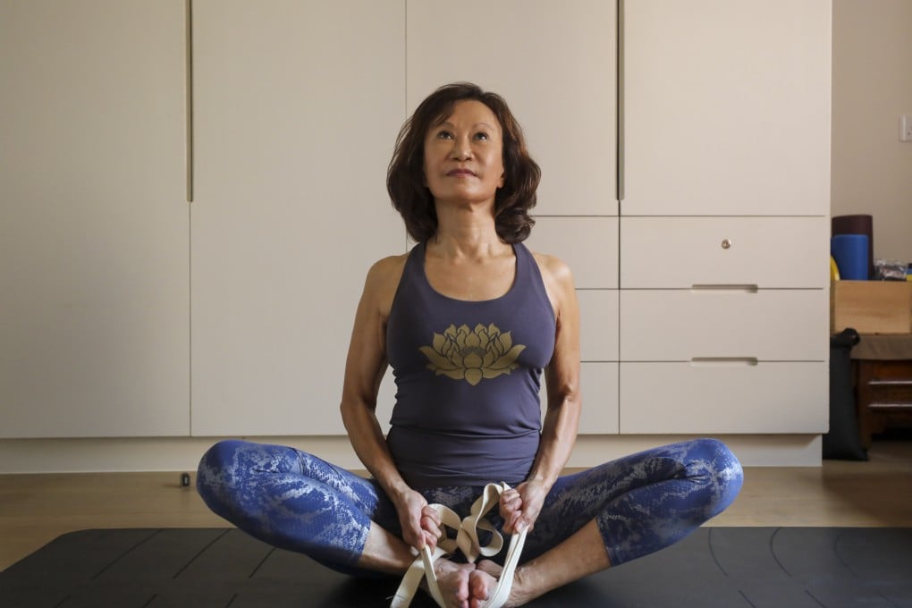 Theresa Brickley does yoga at her home in Tai Tam, Hong Kong. The 69-year-old says keeping fit while listening to your body is key to slowing the ageing process. Photo: Xiaomei Chen