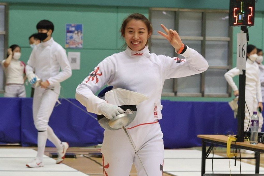 Kaylin Hsieh smiles after winning all six of her group matches at the LCSD Open Fencing Championships at Hong Kong Park Sports Centre. Photo: Shirley Chui