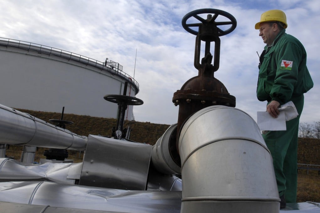 An engineer at the Hungarian Oil and Gas Company (MOL) checks the Druzhba oil pipeline in Szazhalombata, south of Budapest, Hungary. Photo: AP