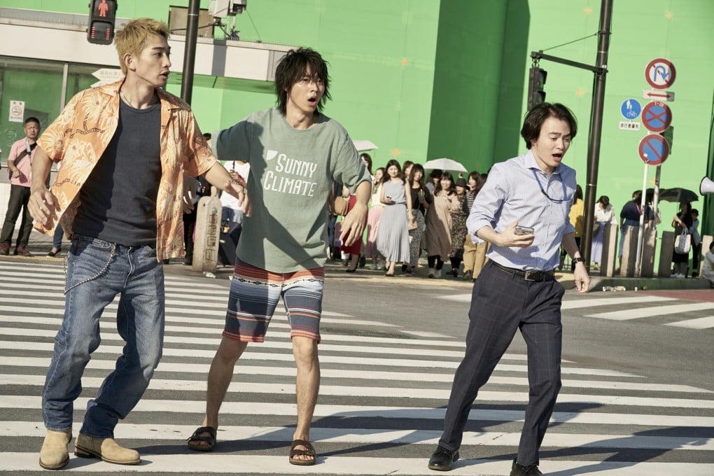 Keita Machida as Daikichi Karube, Kento Yamazaki as Ryohei Arisu and Yuki Morinaga as Chota Segawa filming at Ashikaga Scramble City Studio for Netflix’s Alice in Borderland. Located 90km from the Japanese capital, the set allows productions to shoot scenes that would be impossible at the real Shibuya Crossing. Photo: Netflix