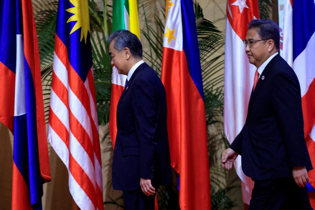 Foreign Minister Wang Yi, followed by South Korean Foreign Minister Park Jin, arrives for a group photo at the Asean Plus Three Foreign Ministers’ Meeting in Phnom Penh on August 4. Photo: Reuters