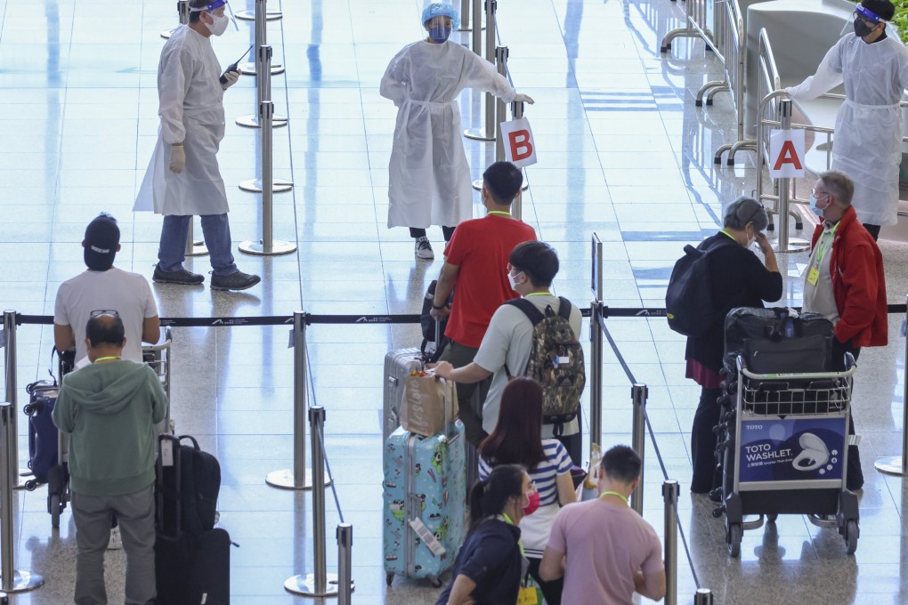 Arrivals at Hong Kong International Airport await transport to their quarantine hotels, in this file photo from August 14. The city has cut the hotel quarantine period from seven days to three, but this is not enough, says HKIFA chairman Nelson Chow. Photo: Dickson lee