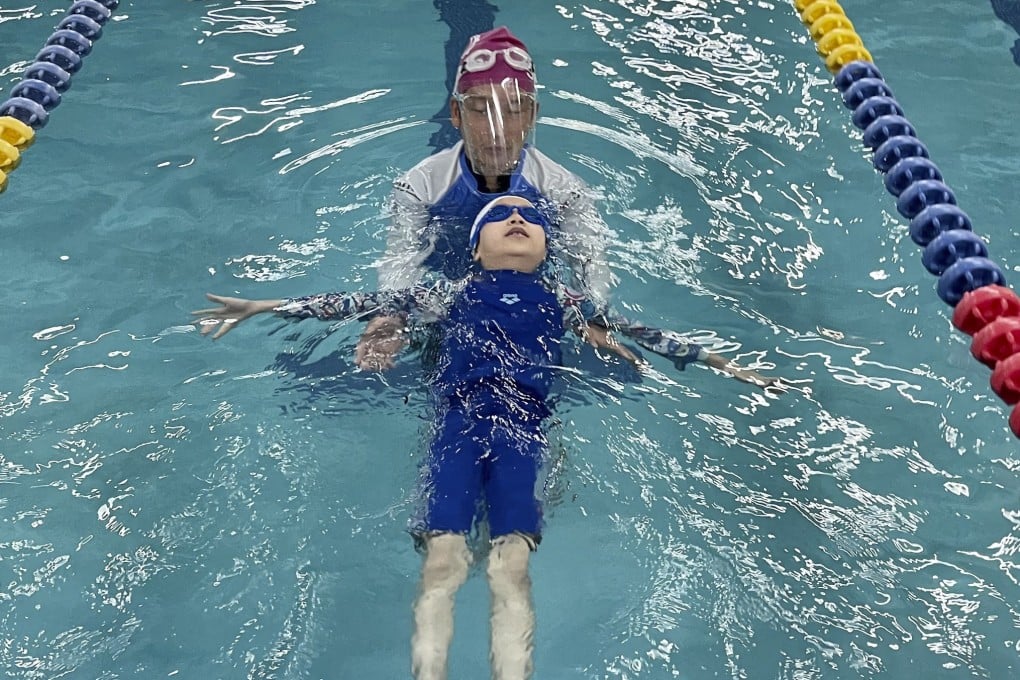 Prevent drowning by following some simple steps. During a Splash swimming course, a swimmer practises the back float, which is an important survival position. Photo: Splash Foundation