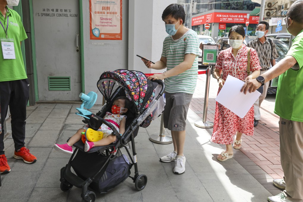 Young people receive Sinovac vaccination for the coronavirus disease Community Vaccination Centre. Photo: Edmond So