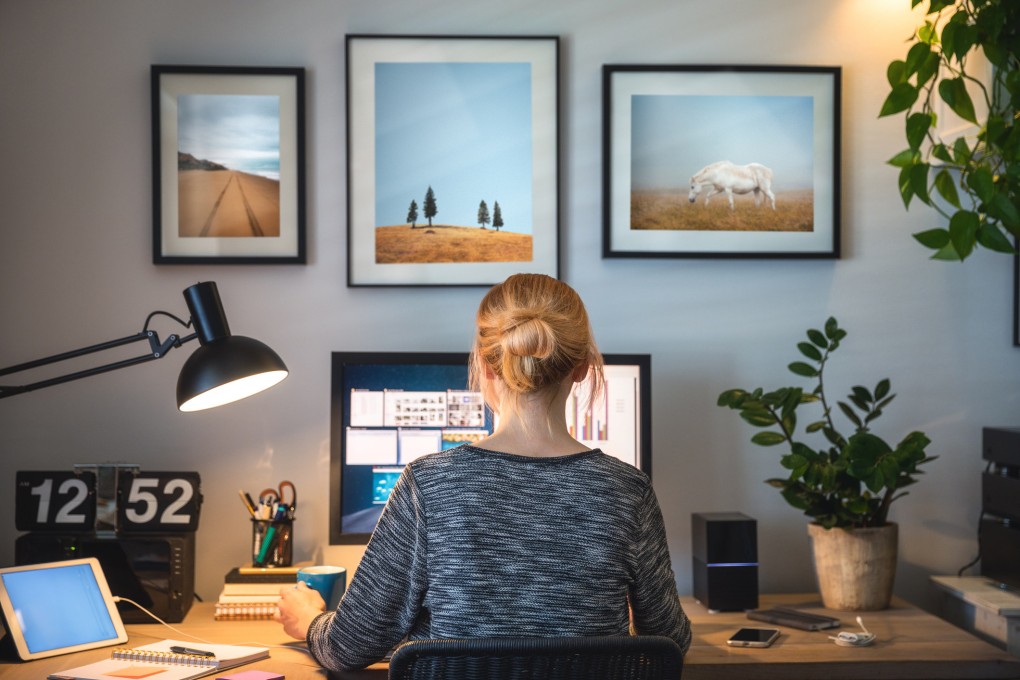 Woman working on computer in her home office during pandemic quarantine. Photo: Getty