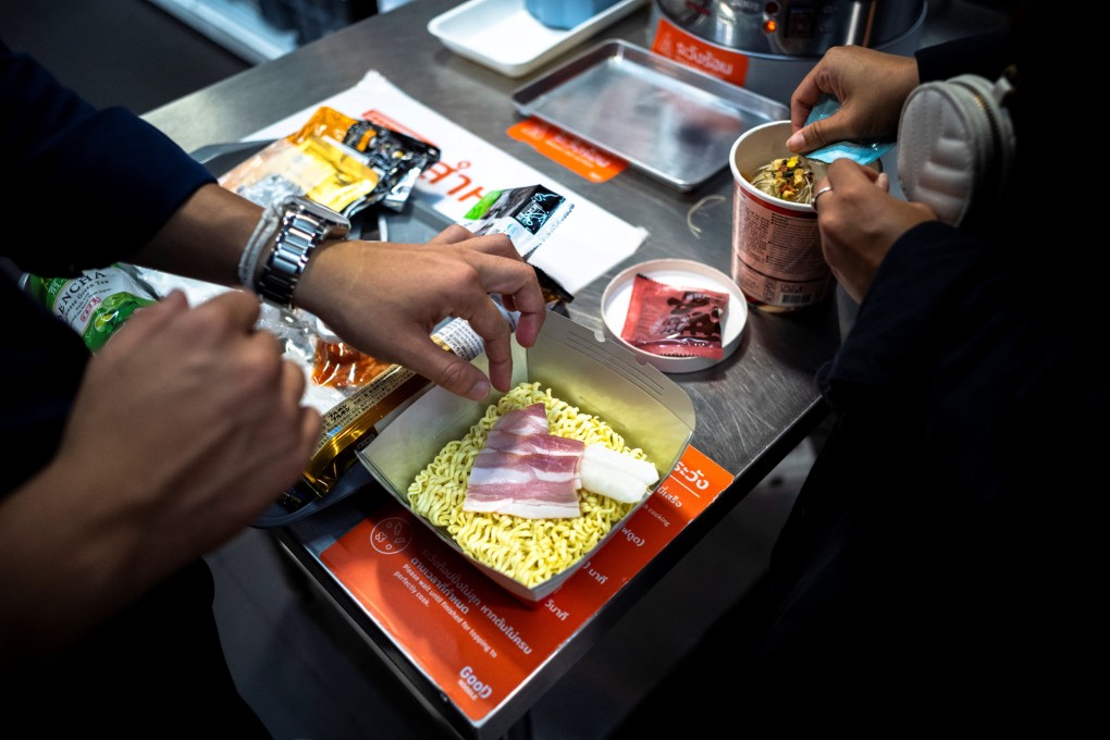 People prepare instant noodles before cooking at the Good Noodle store in Bangkok, Thailand. Photo: Reuters/File
