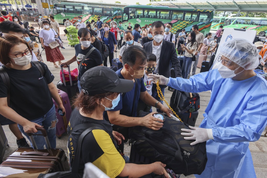 Travellers from Hong Kong heading to mainland China through Shenzhen Bay Port. Photo: Dickson Lee