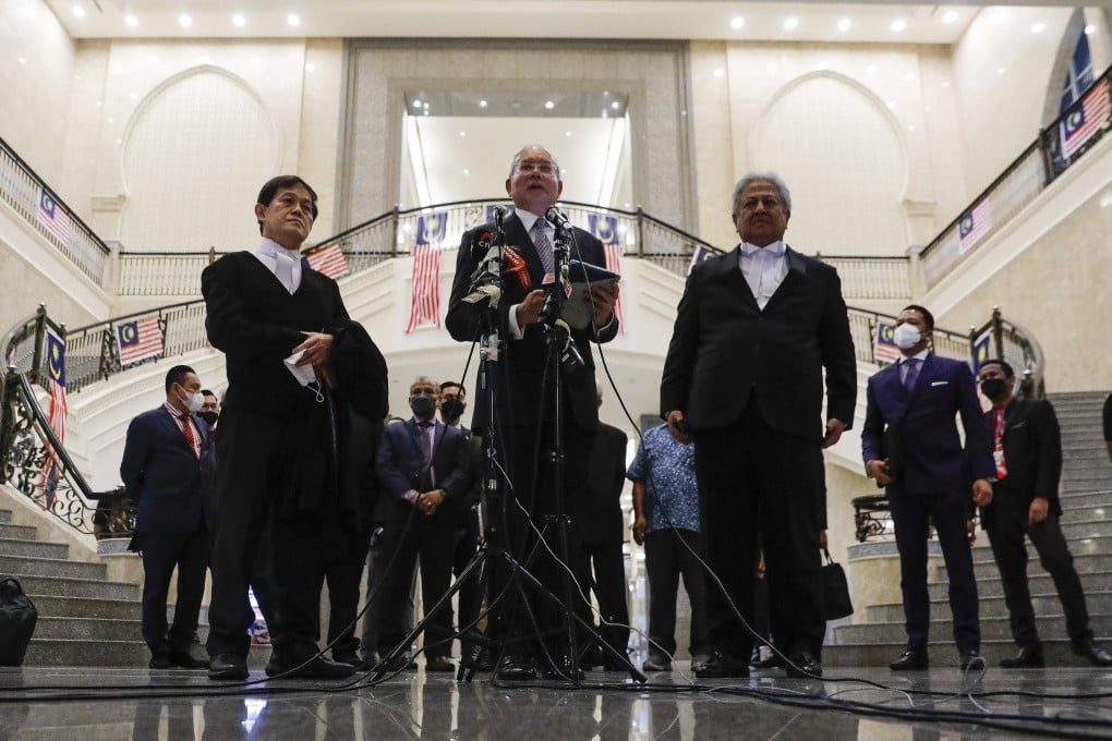 Former Malaysian prime minister Najib Razak (centre) speaks during a press conference at the Federal Court in Putrajaya, Malaysia, on August 16. Malaysia’s Federal Court has dismissed Najib’s application to introduce new evidence in his final appeal that would spark a retrial. Photo: EPA-EFE