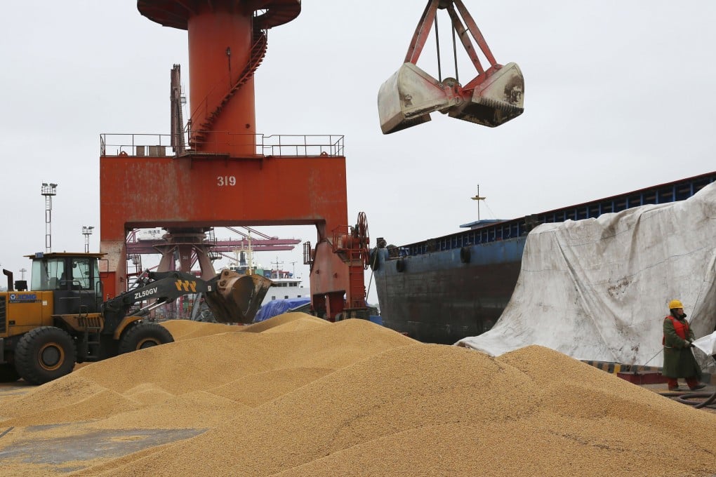 China imports more Brazilian soybeans - seen here being unloaded in Jiangsu province - than it gets from Russia. Photo: AP