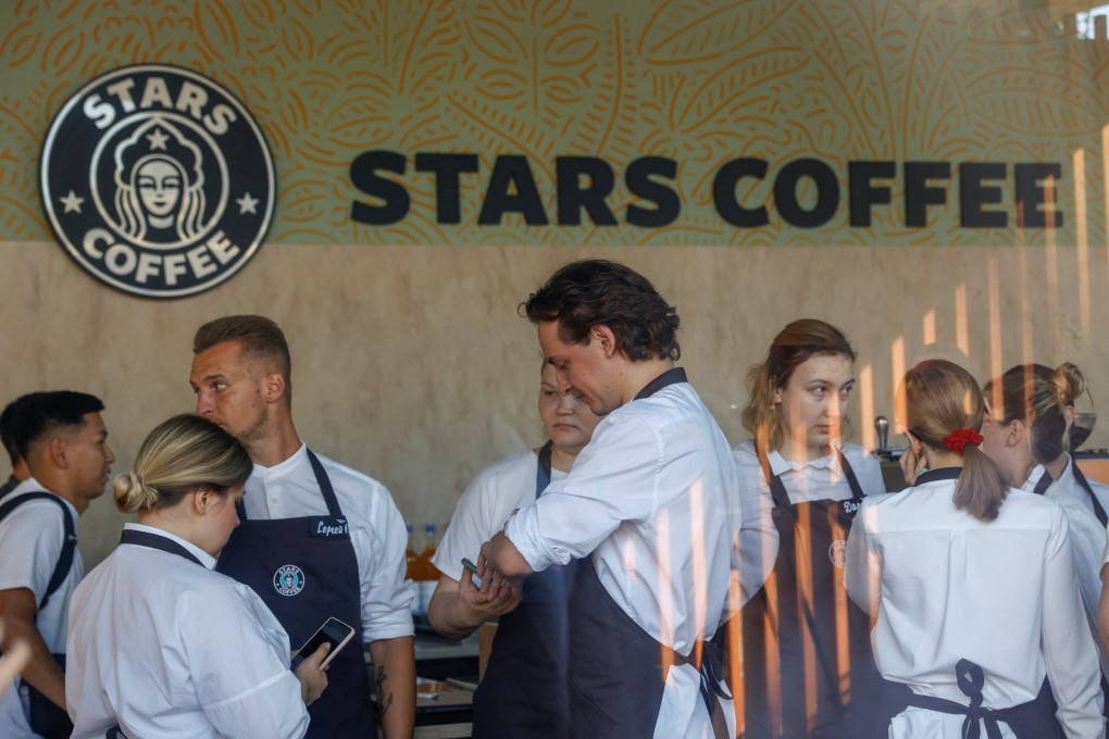 Staff members get ready for the launching of the new coffee shop “Stars Coffee”, which opens following Starbucks Corp company’s exit from the Russian market. Photo: Reuters
