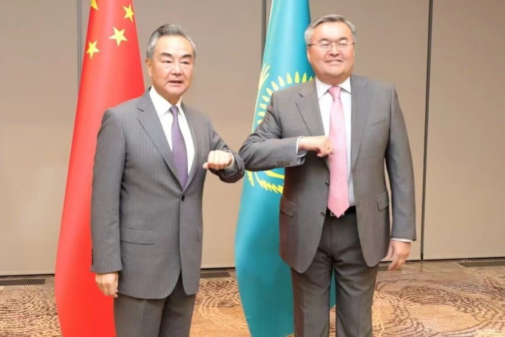 Chinese Foreign Minister Wang Yi and his Kazakh counterpart Mukhtar Tleuberdi during a meeting in Uzbekistan in July. The Central Asia region is critical to China, which shares almost 1,800km of borders with it. Photo: Handout via Xinhua