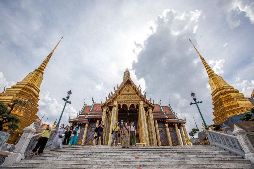 Tourists at the Grand Palace in Bangkok, Thailand – the country will allow visitors to stay for up to 30 days from October. Photo: Xinhua