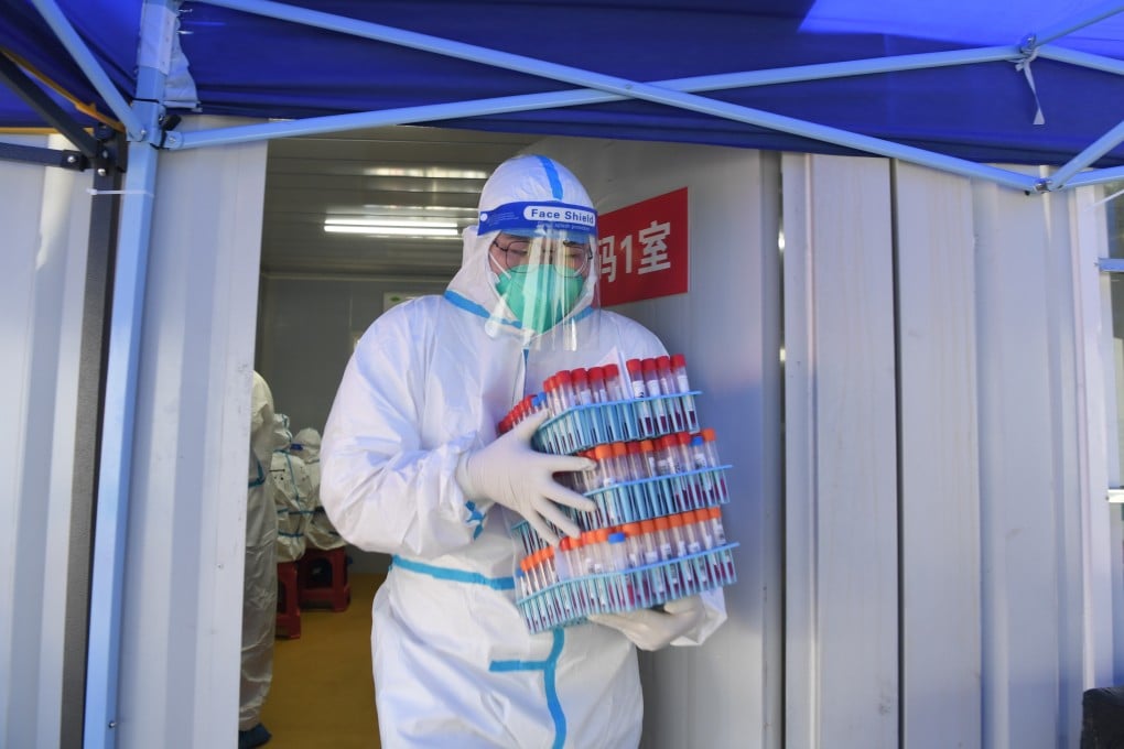 Stringent coronavirus controls such as mass testing have become a huge burden for local governments. Photo: Xinhua