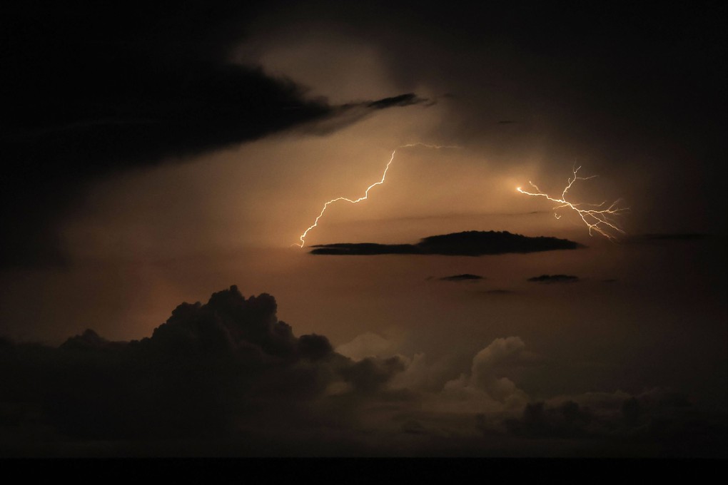 Lightning flashes in a supercell thunderstorm over the Mediterranean sea on August 18 2022 as extreme weather ravages Europe. Photo AFP
