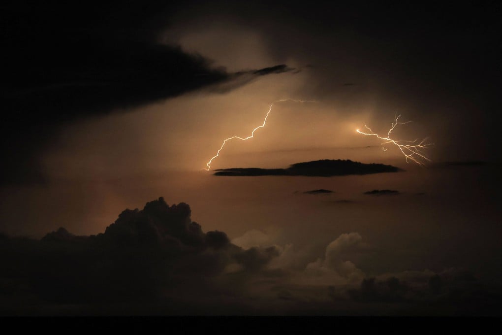 Lightning flashes in a supercell thunderstorm over the Mediterranean sea on August 18 2022 as extreme weather ravages Europe. Photo AFP