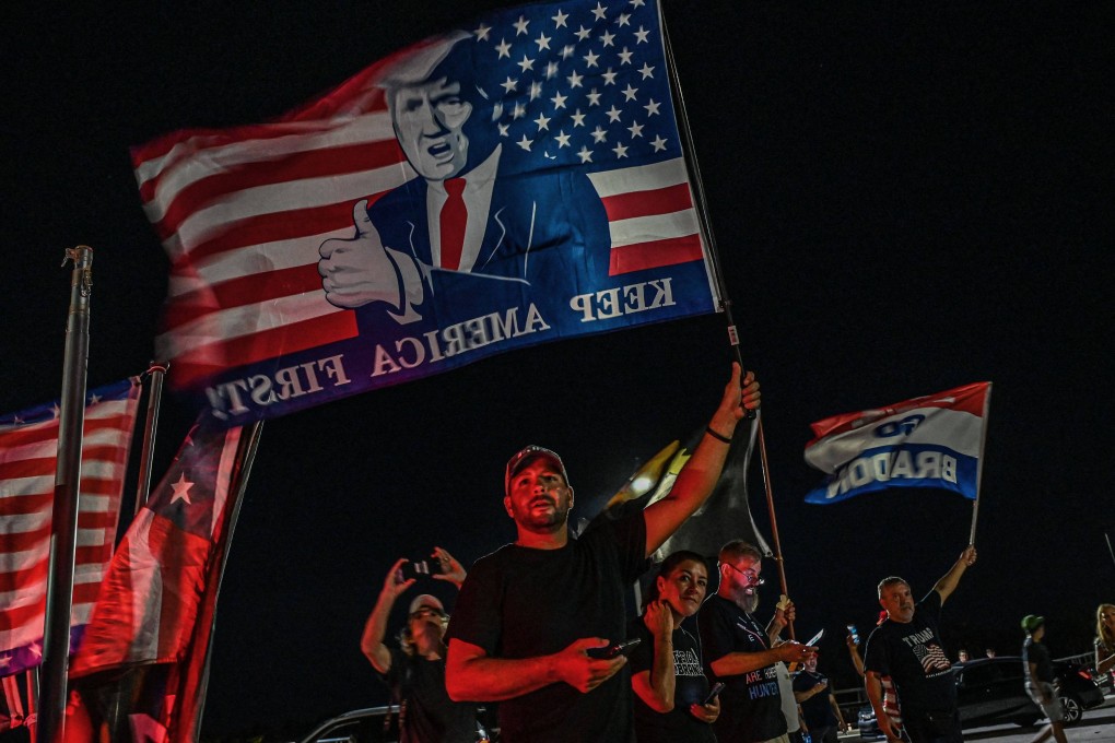 Supporters of former US president Donald Trump stand outside his residence in Mar-a-Lago, Florida, on August 8. Photo: AFP