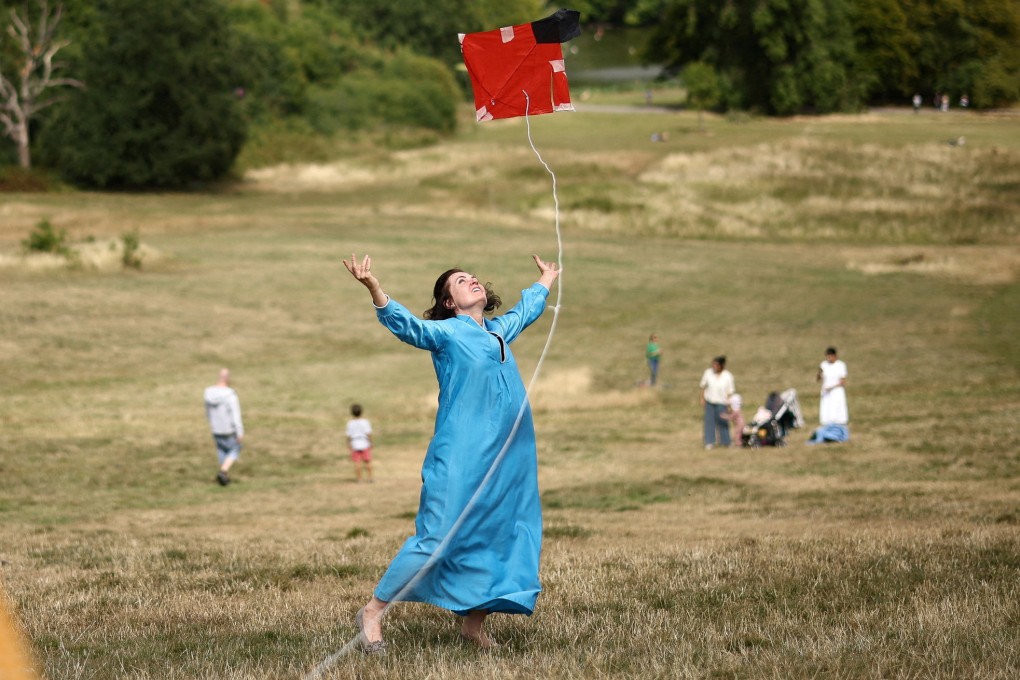 A person flies a kite on Parliament Hill, London on Saturday during ‘Fly With Me’, a kite festival celebrating Afghan culture during the one-year anniversary of the country falling into Taliban rule. Photo: Reuters